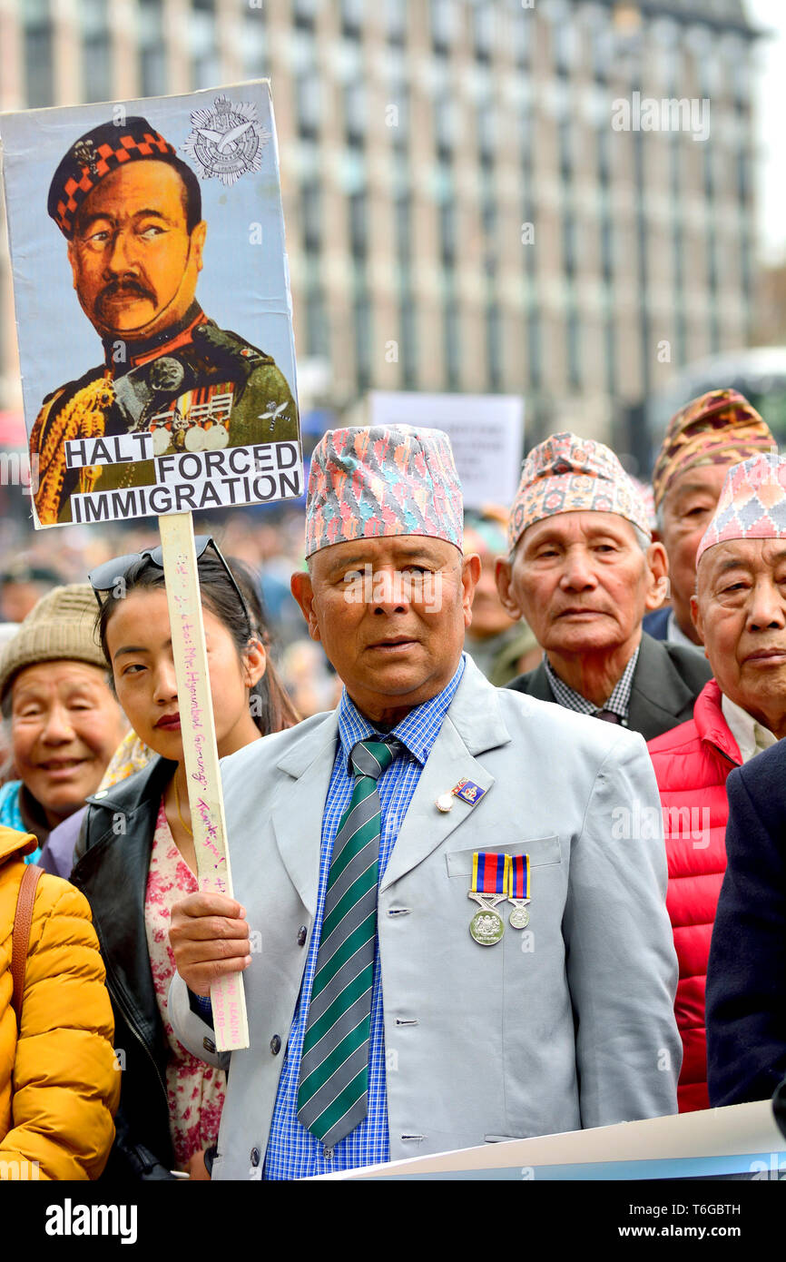 London, UK. 1st May 2019. Gurkha veterans march to Parliament Square demanding equal rights with British and Commonwealth soldiers Credit: PjrFoto/Alamy Live News Stock Photo