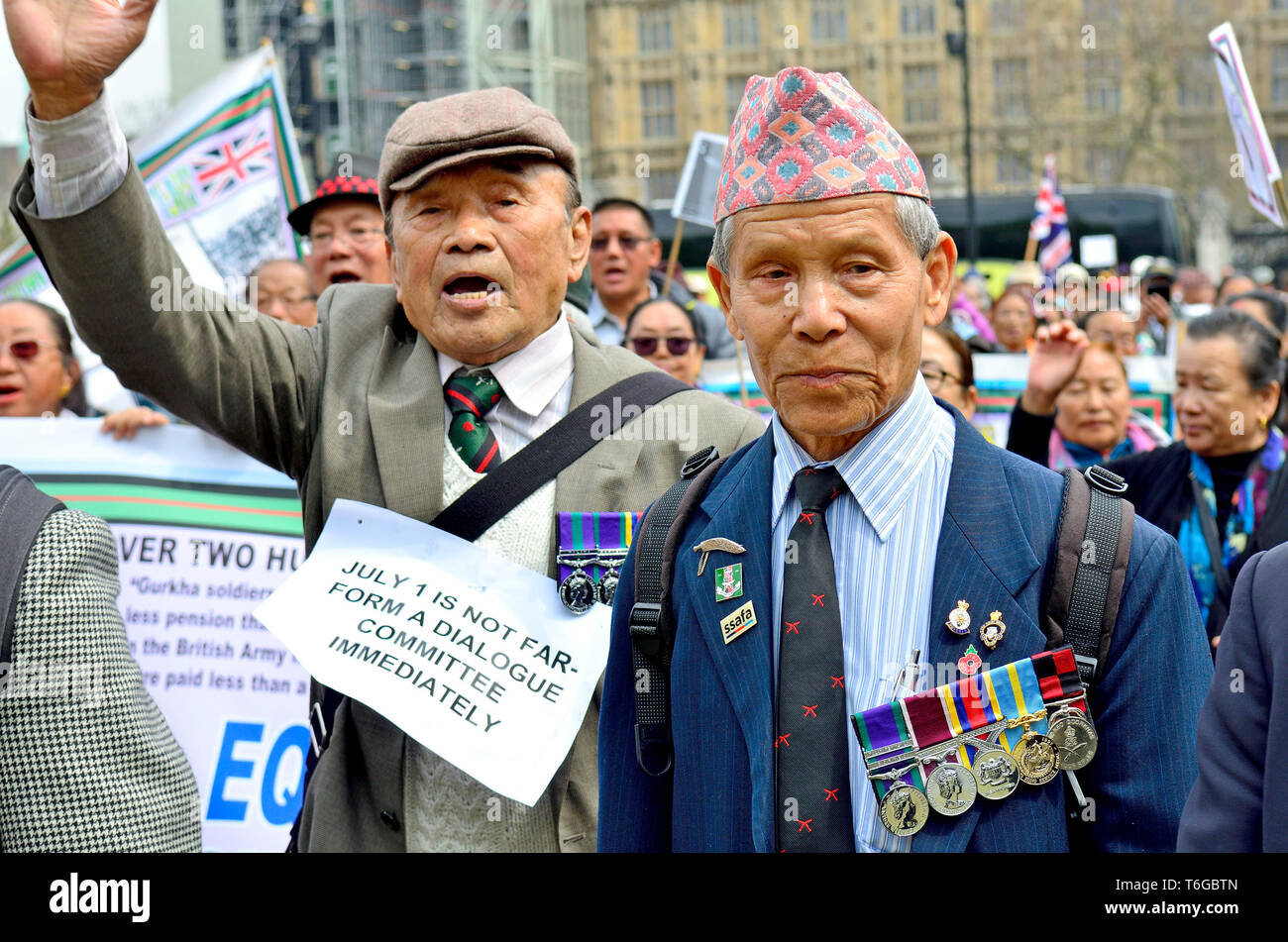 London, UK. 1st May 2019. Gurkha veterans march to Parliament Square demanding equal rights with British and Commonwealth soldiers Credit: PjrFoto/Alamy Live News Stock Photo