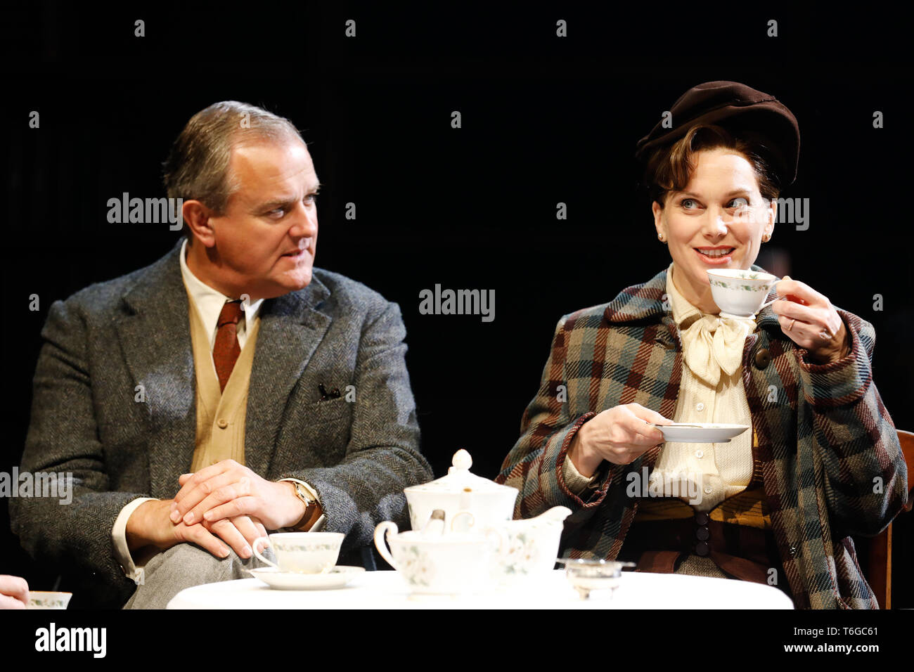 Chichester, UK. 1st May 2019. Hugh Bonneville (L) performs as C.S. Lewis, with Liz White (as Joy Gresham) during a photocall for William Nicholson's 'Shadowlands' at the Chichester Festival Theatre in West Sussex, UK Wednesday May, 1, 2019. The play, directed by Rachel Kavanaugh, runs until May 25. Photograph : Credit: Luke MacGregor/Alamy Live News Stock Photo