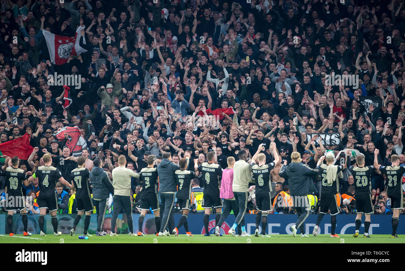 London, UK. 30th Apr 2019. Ajax supporters cheer there team at full time  during the UEFA Champions League semi-final 1st leg match between Tottenham  Hotspur and Ajax at Tottenham Hotspur Stadium, High