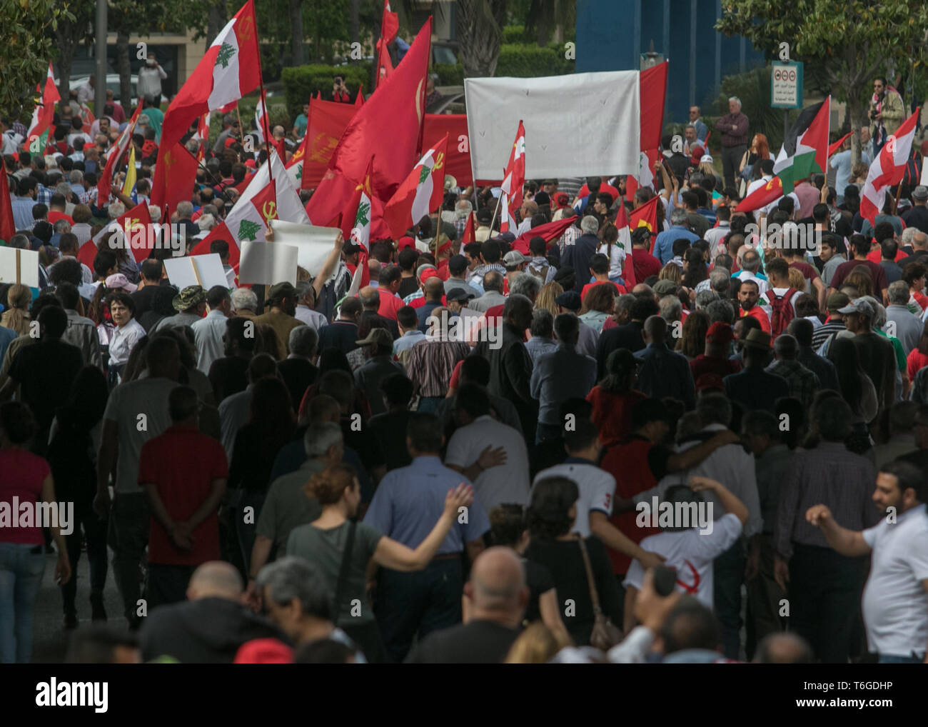 Beirut, Lebanon. 1st May, 2019. Thousands of supporters of the Lebanese Communist party take part in a May Day rally through central Beirut as they mark International Workers' Day Credit: amer ghazzal/Alamy Live News Stock Photo