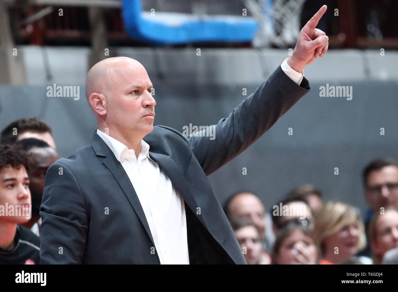 01 May 2019, Bavaria, Würzburg: Basketball: Europe Cup, s.Oliver Würzburg - Dinamo Sassari, knockout round, finals, second legs, in the s.Oliver Arena. The Würzburg coach Denis Wucherer gestures on the edge of the field. Photo: Daniel Karmann/dpa Stock Photo