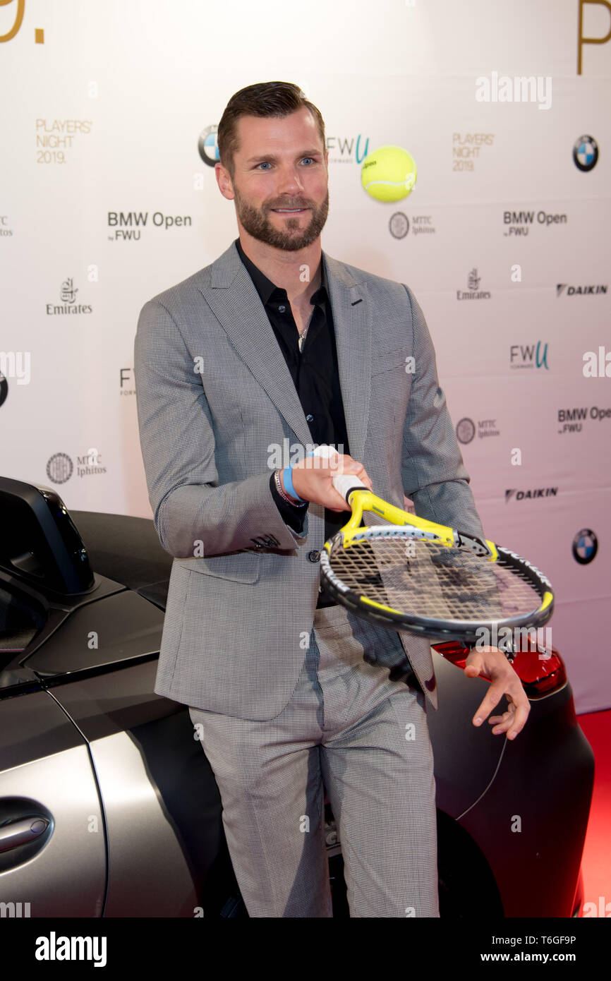 Munich, Germany. 30th Apr, 2019. Martin Tomczyk, racing car driver, comes  to the "Players Night" to present the Iphitos Award to the tennis club MTTC  Iphitos e.V. The event takes place as