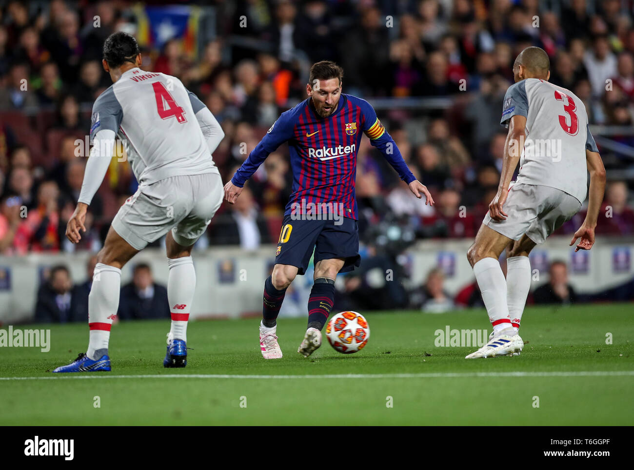 Camp Nou, Barcelona, Spain. 1st May, 2019. UEFA Champions League football,  semi final 1st leg, FC Barcelona versus Liverpool; Lionel Messi of Barcelona  keeps control in a tight space in between Virgil