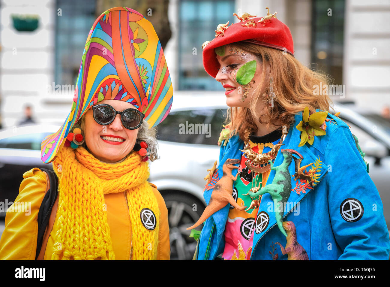 London, UK. 1st May, 2019. Protesters have turned up in fashionable, bright outfits. Extinction Rebellion have organised a 'Carnival of Chaos' outside the Brazilian Embasssy in central London. The protest is to highlight XR's 'solidarity with the people of Brazil, joining the fight to defend the planet's ecosystem' and is attended by several figures from the fashion industry. Credit: Imageplotter/Alamy Live News Stock Photo