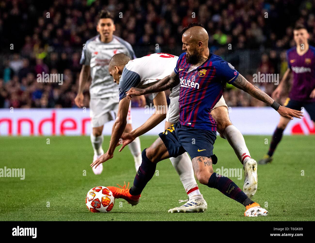 Barcelona, Spain. 1st May, 2019. FC Barcelona's Arturo Vidal (R front) vies with Liverpool's Joel Matip during the UEFA Champions League semifinal first leg soccer match between FC Barcelona and Liverpool in Barcelona, Spain, on May 1, 2019. Barcelona won 3-0. Credit: Joan Gosa/Xinhua/Alamy Live News Stock Photo