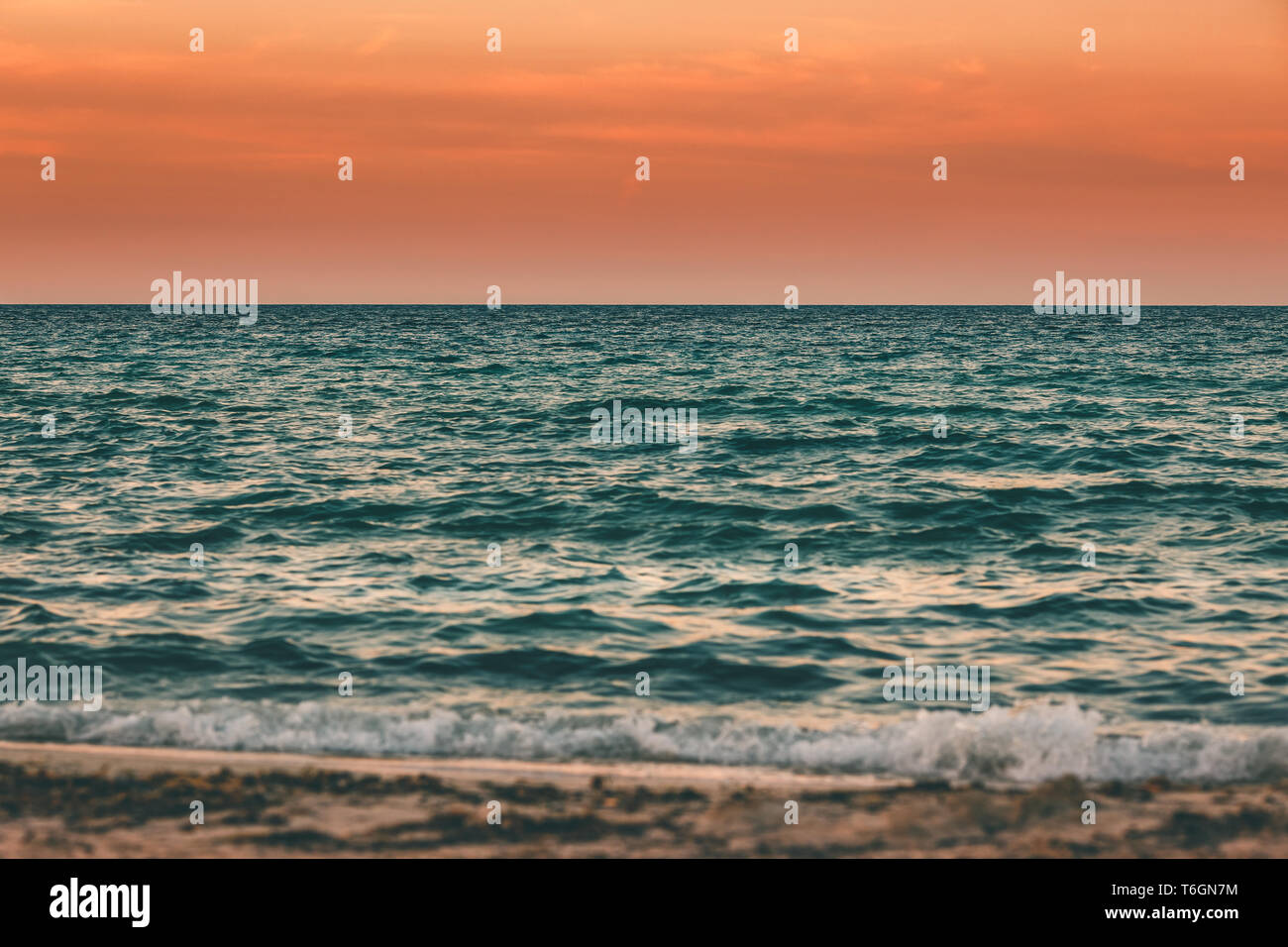 Seascape at sunset during golden hour Stock Photo