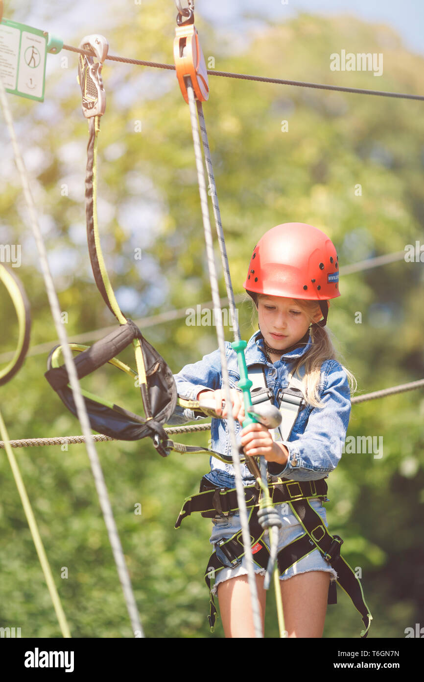 Child climbing rope hires stock photography and images Alamy