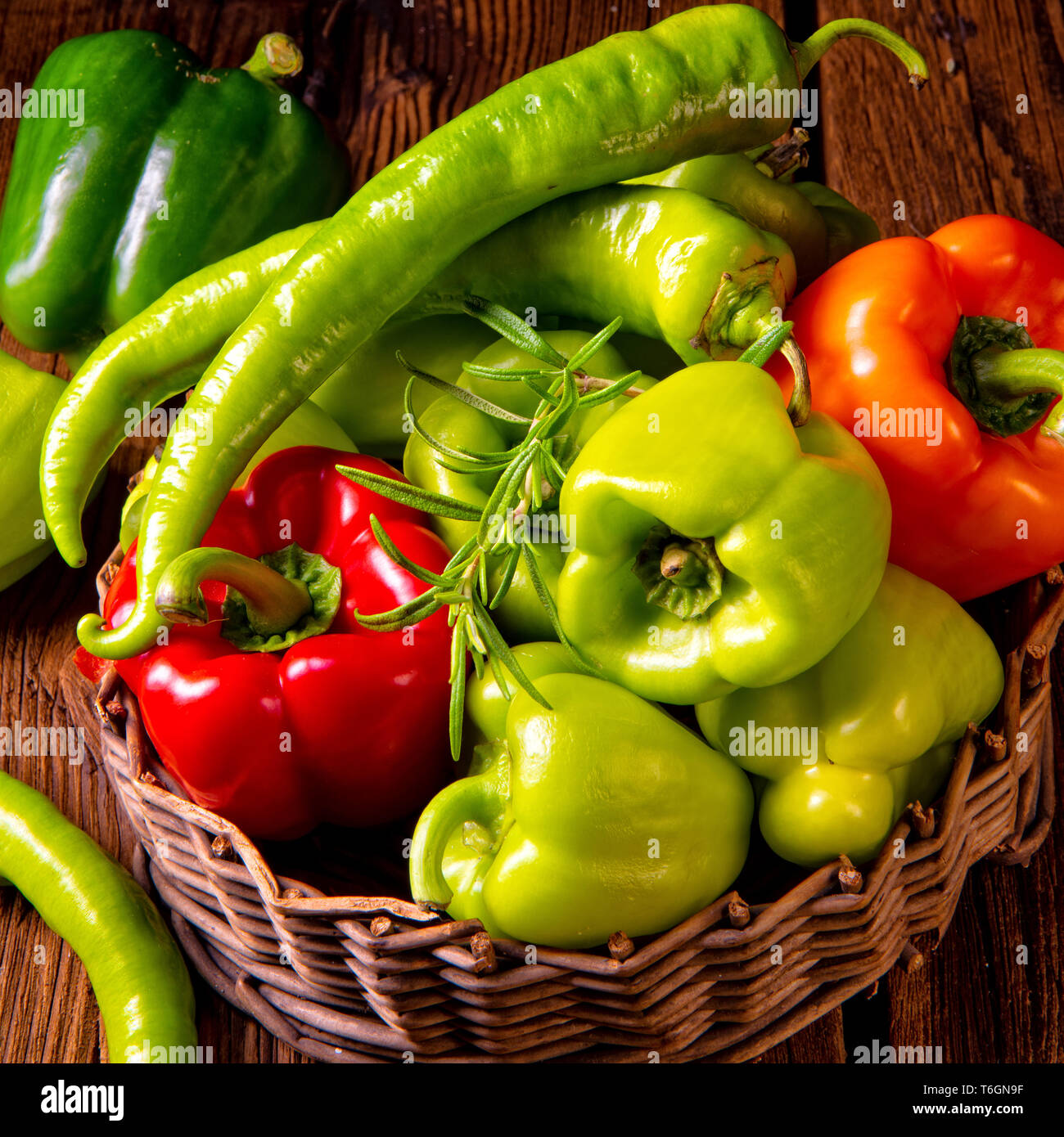 various harvested peppers and hot peppers in basket Stock Photo - Alamy