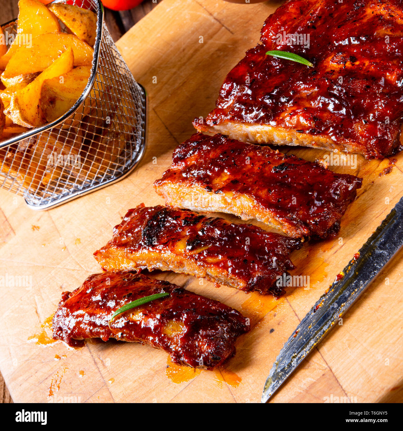 BBQ spare ribs from a charcoal grill Stock Photo - Alamy