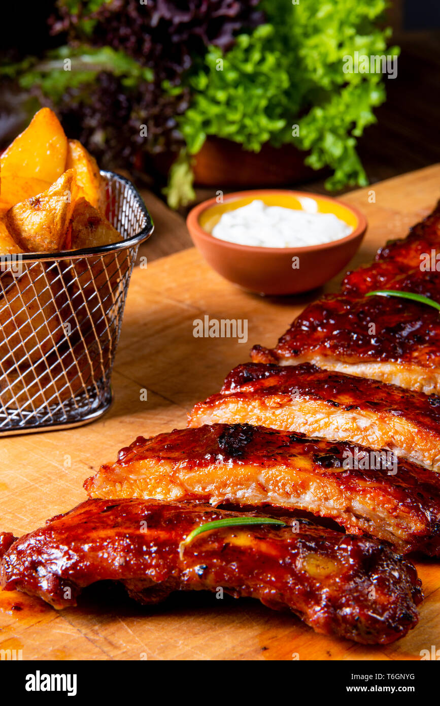 BBQ spare ribs from a charcoal grill Stock Photo Alamy