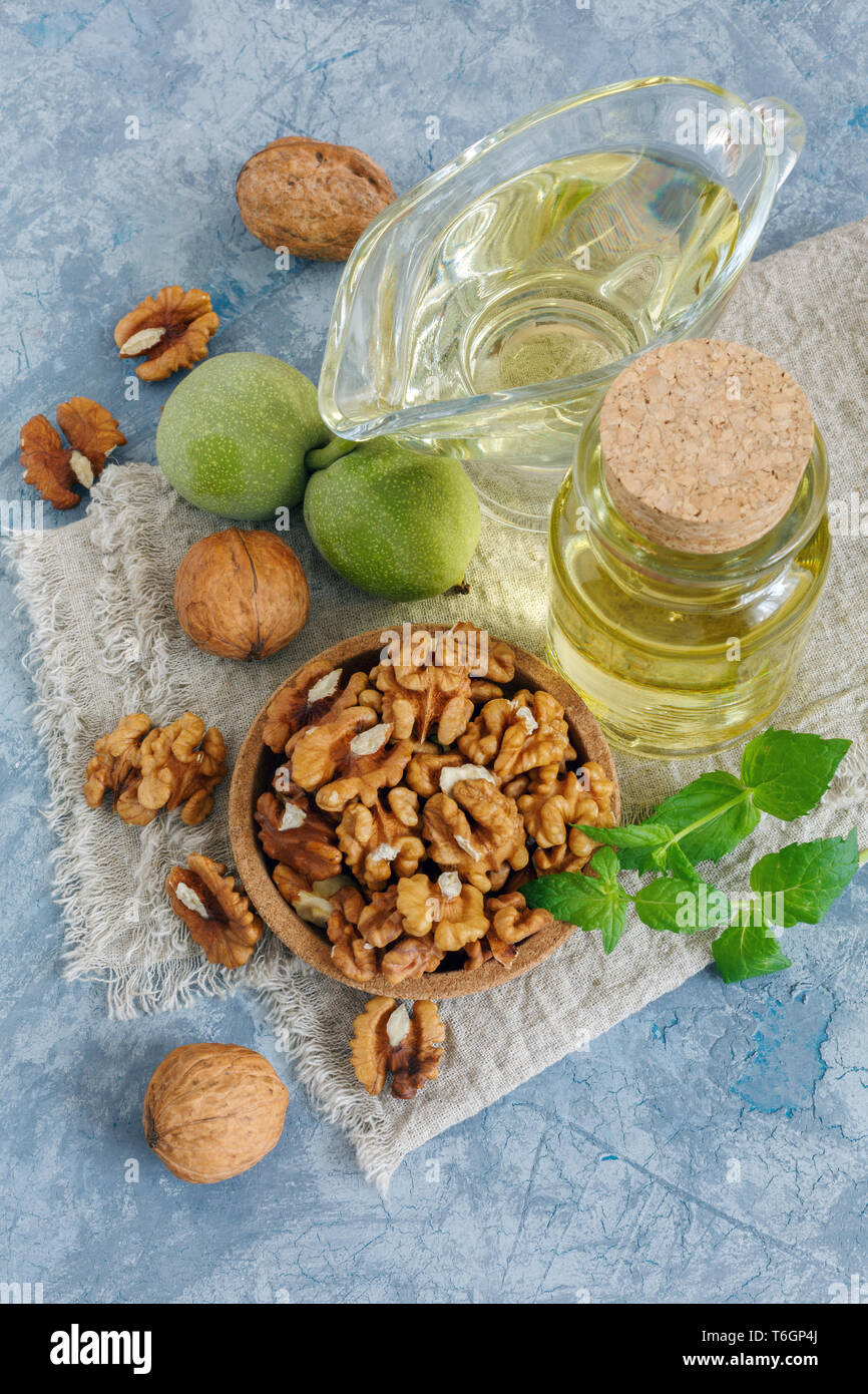 Cold pressed walnut oil and walnut kernel Stock Photo Alamy