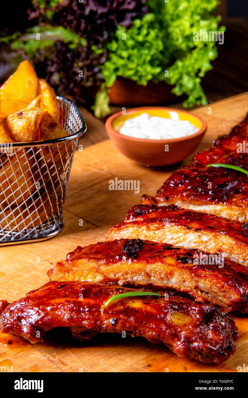 BBQ spare ribs from a charcoal grill Stock Photo Alamy