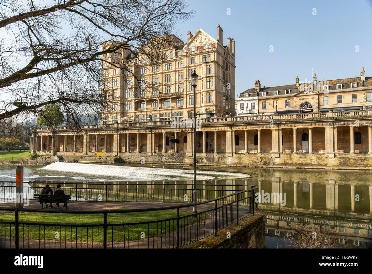 The Empire Hotel Grand Parade with reflections in the river Avon, City of Bath, Somerset, England, UK Stock Photo