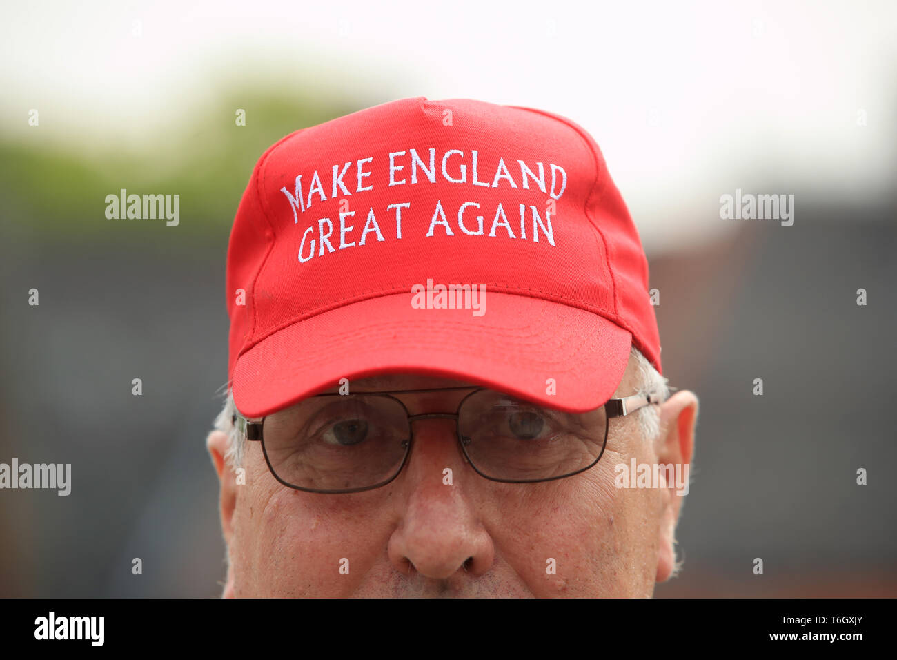 A man wears a 'make England great again' hat, as voters gather ahead of Ukip's EU election campaign and manifesto launch at the Dorman Museum in Middlesbrough. Stock Photo