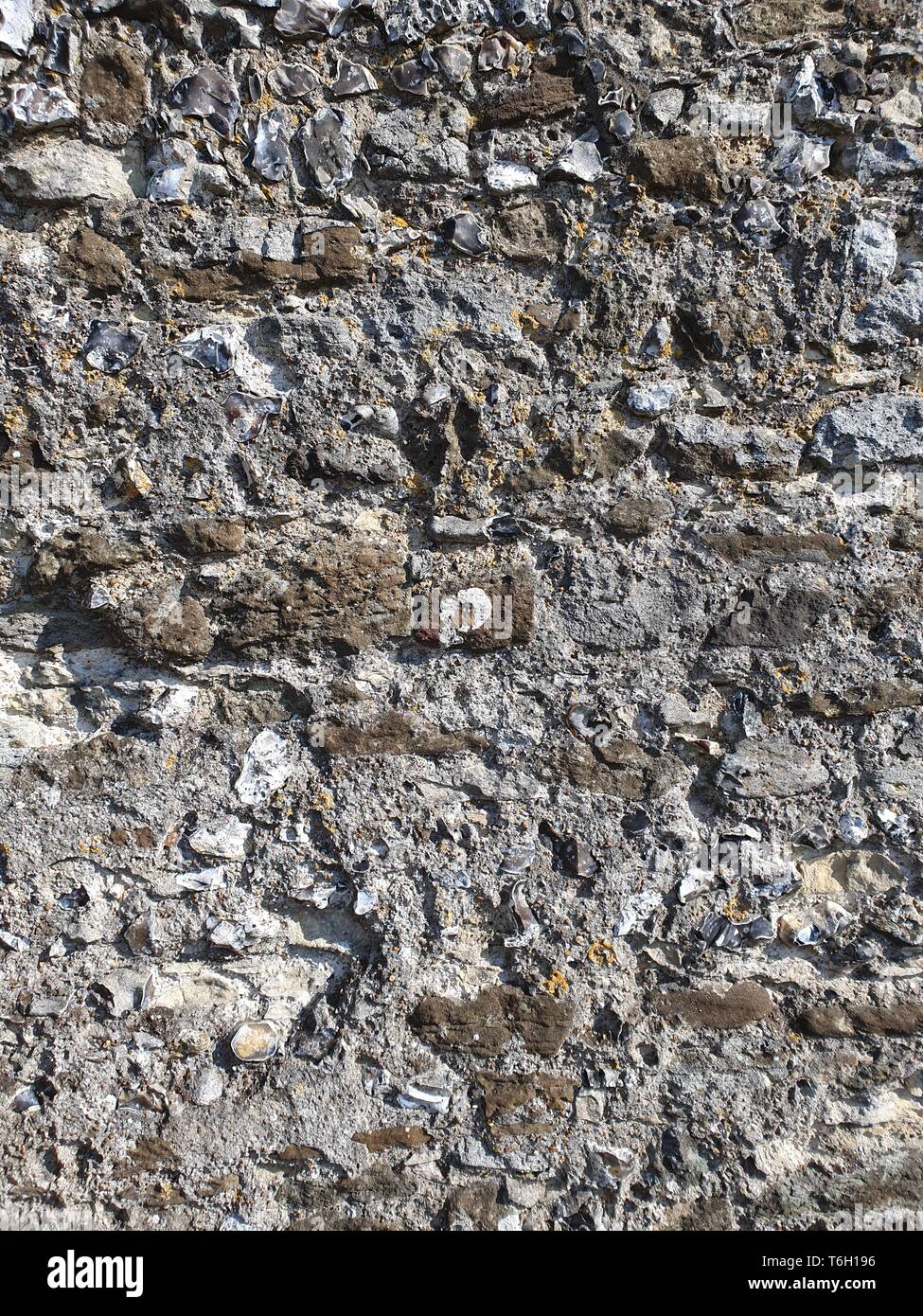 Beautiful stylish stone wall in the old style, textured background