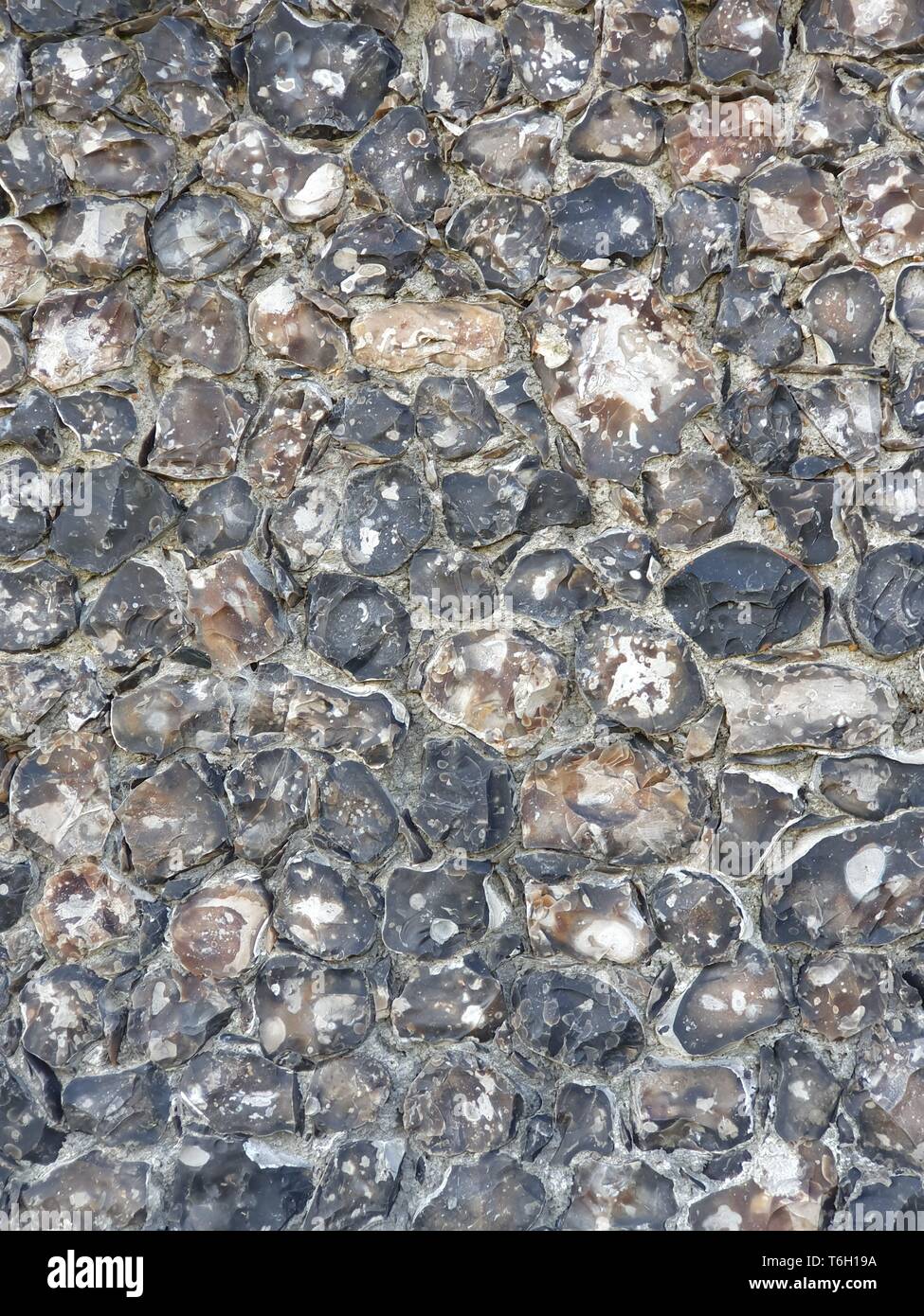 Beautiful stylish stone wall in the old style, textured background