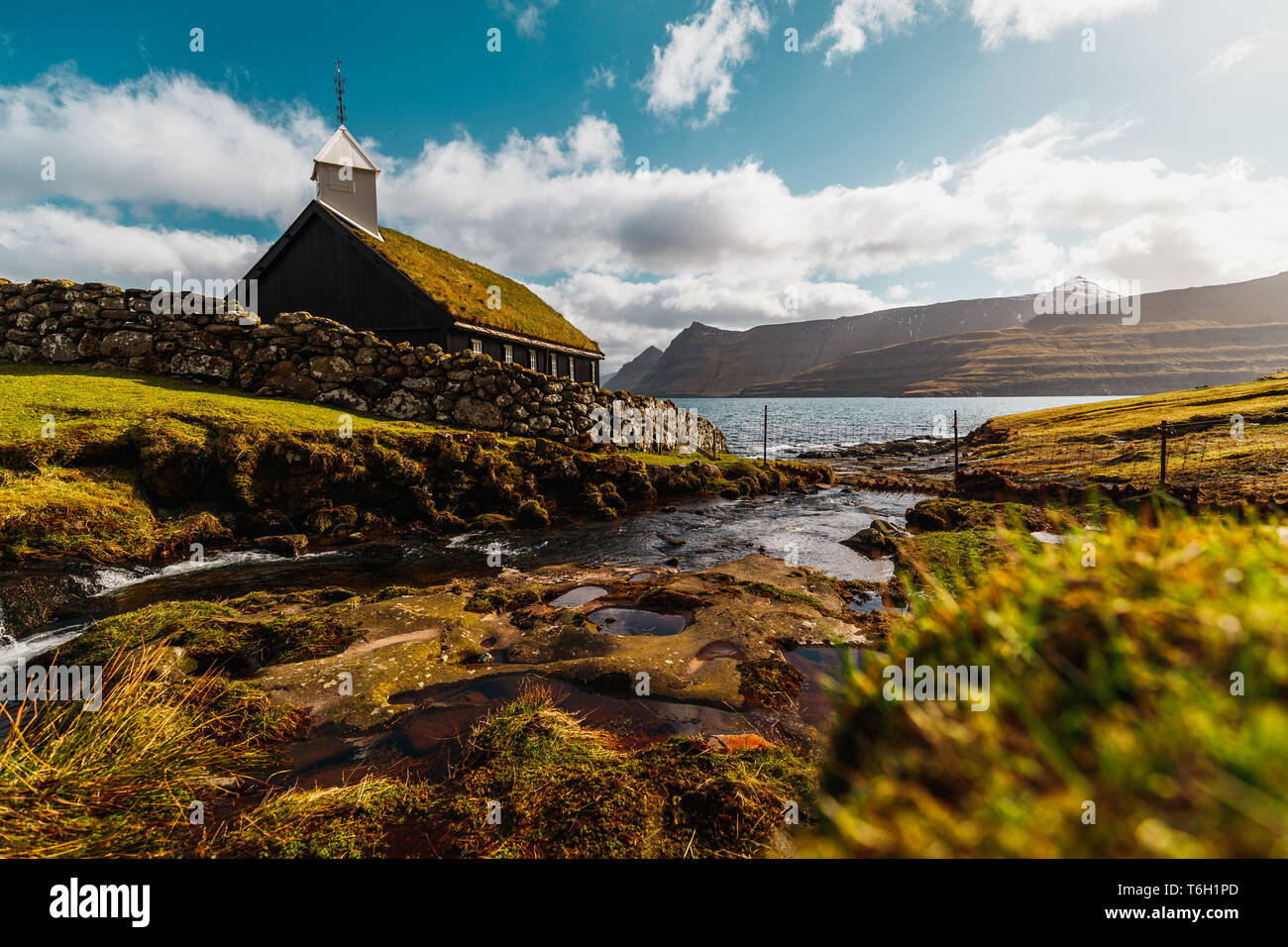 The small picturesque black wooden church of Funningur (Funnings