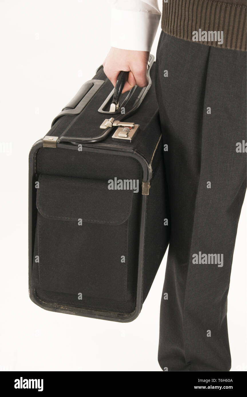 clutch the suitcase Stock Photo