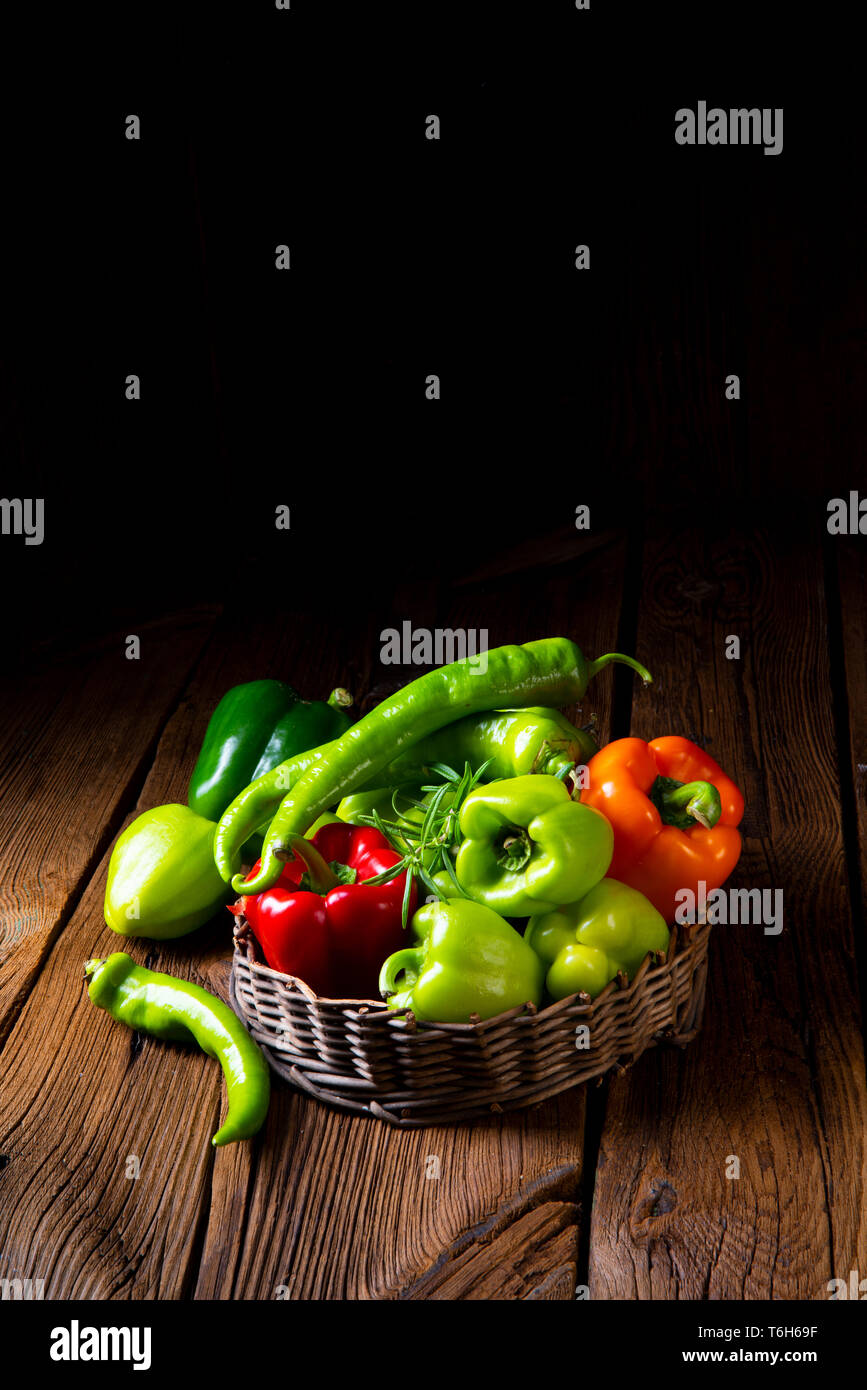 various harvested peppers and hot peppers in basket Stock Photo - Alamy