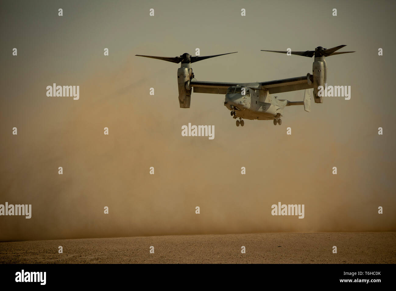 U.S. Marines with Marine Tilt Rotor Squadron 364, attached to Special Purpose Marine Air Ground Task Force Crisis Response-Central Command, land an MV-22 Osprey during a tactical recovery of aircraft and personnel exercise at Camp Buehring, Kuwait, April 28, 2019. The SPMAGTF-CR-CC is a multiple force provider designed to employ ground, logistics and air capabilities throughout the Central Command area of responsibility. (U.S. Marine Corps photo by Sgt. Justin Huffty)  Stock Photo