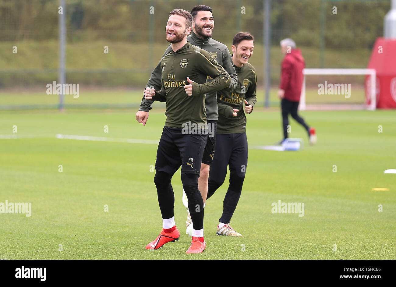 Arsenal's Shkodran Mustafi (left) Sead Kolasinac, and Mesut Ozil (right)  during the training session at London Colney Stock Photo - Alamy