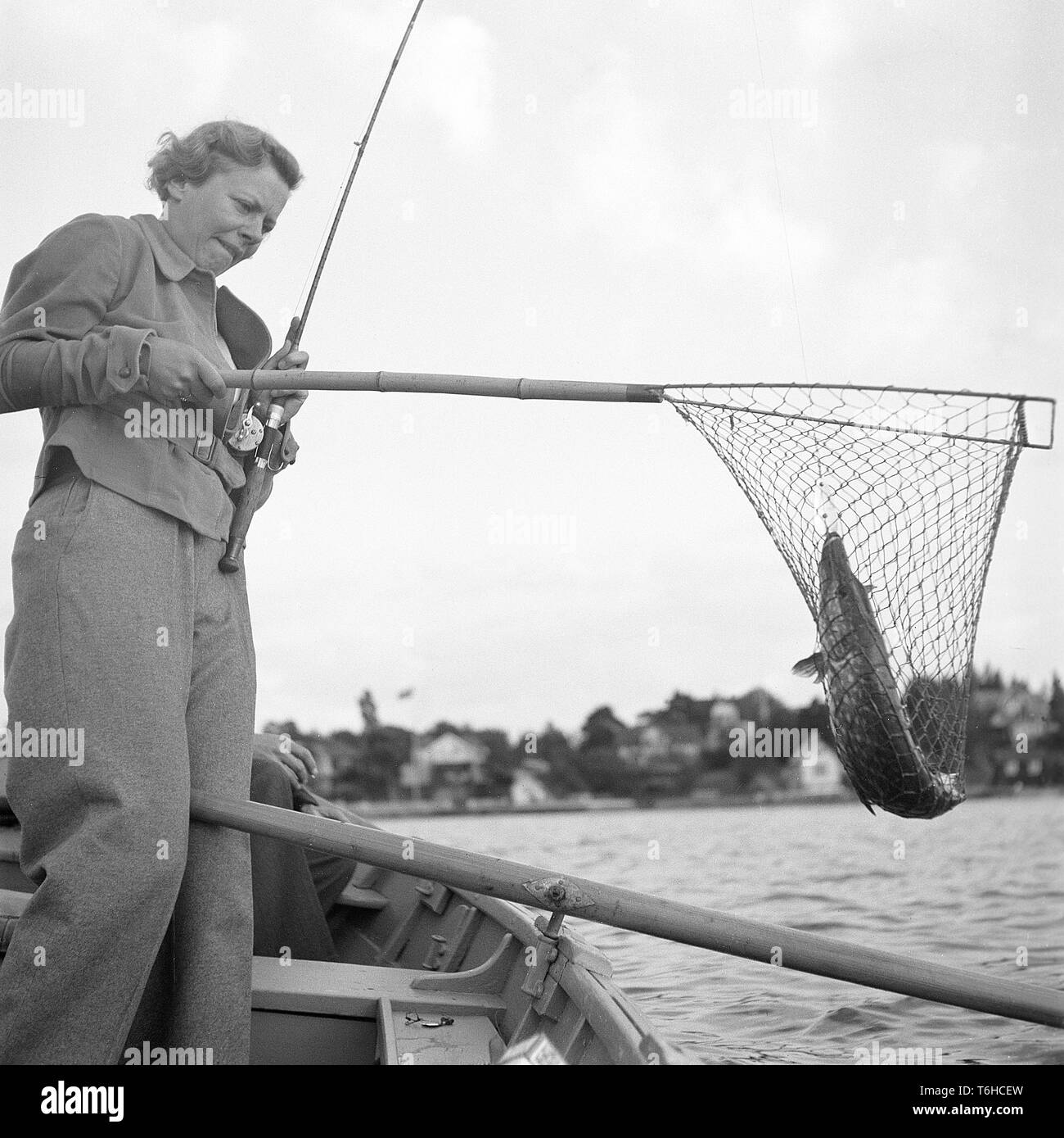Angler fishing vintage hi-res stock photography and images - Alamy