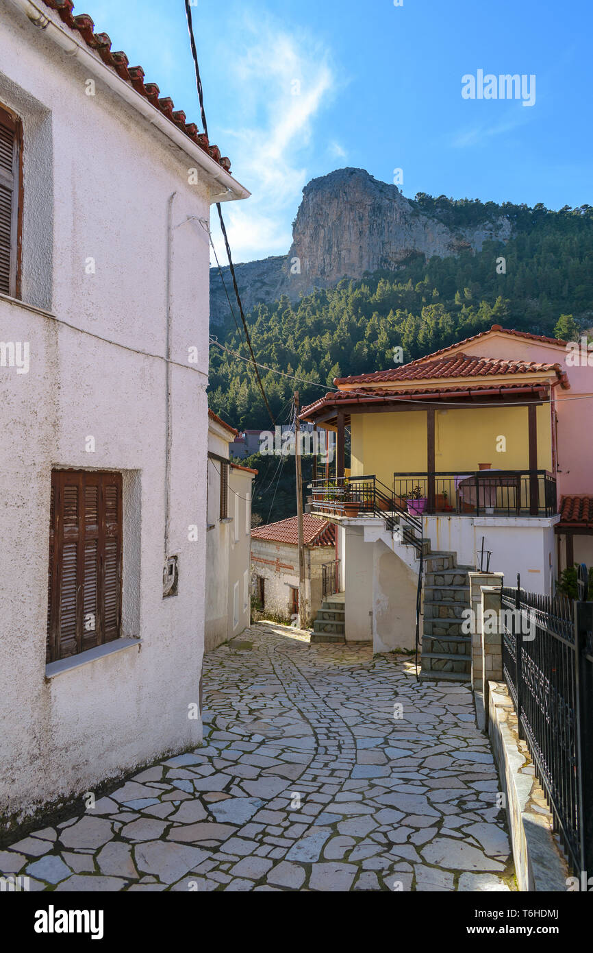 Alley at Steni village with Karaouli at the bakcground, Evia Stock Photo