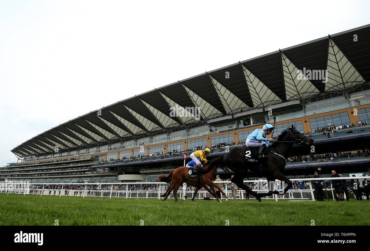 Ventura Rebel ridden by jockey Paul Hanagan winning the Irish Thoroughbred Marketing Royal Ascot Two-Year-Old Trial Conditions Stakes during Royal Ascot Trials Day at Ascot Racecourse. Stock Photo