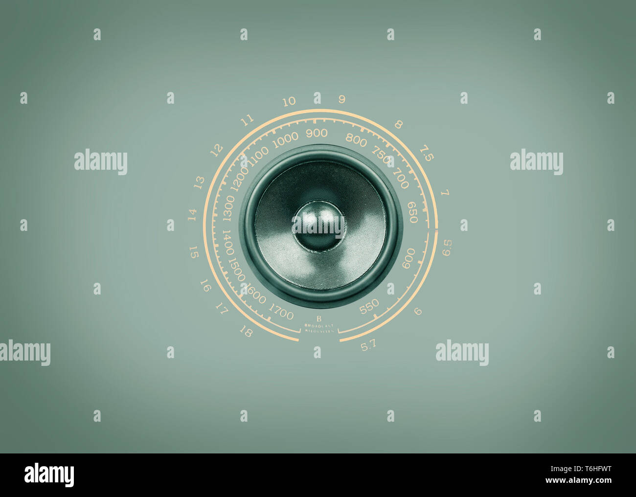Radio speaker on a retro green background Stock Photo