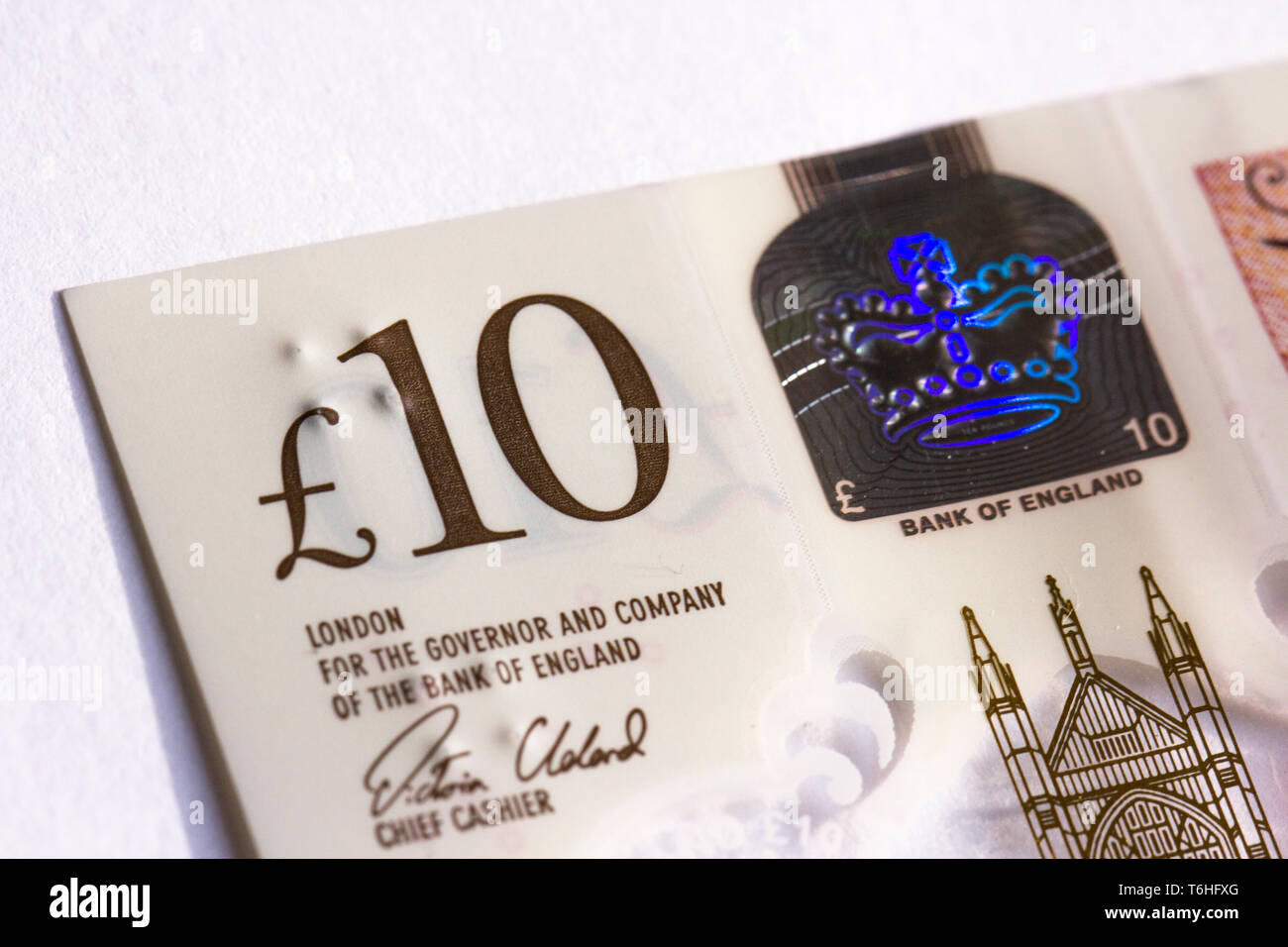Close-up, macro photo of piece of £10 banknote. Ten pounds sterling ...