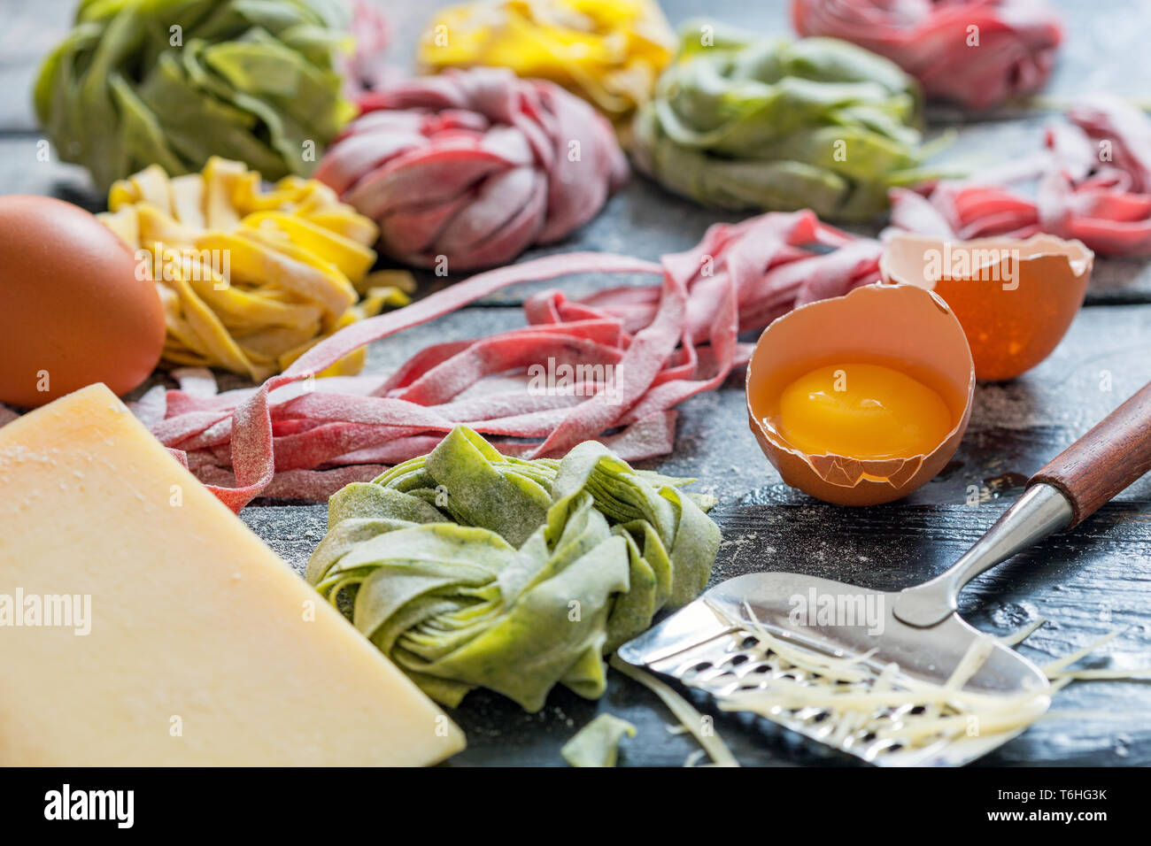 Homemade colored pasta, cheese and egg yolk Stock Photo Alamy