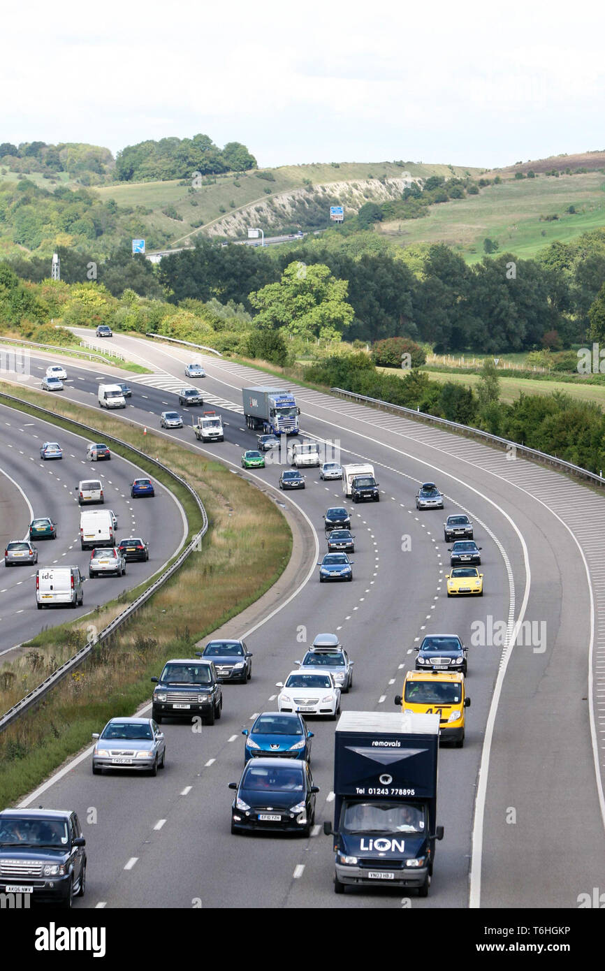 The busy M3 Motorway cuts through Twyford Down near Winchester in Hampshire England circa 2012. Stock Photo