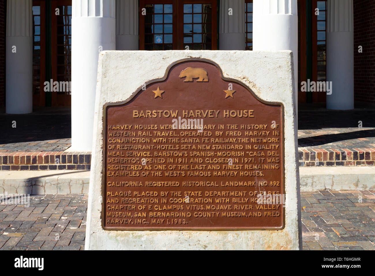Barstow, CA / USA – April 14, 2019: Commemoration Plaque for the famous Barstow Harvey House located at 685 North 1st Avenue in Barstow, California. Stock Photo