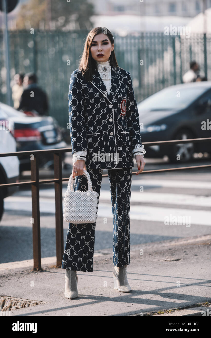 Milan, Italy - February 20, 2019: Street style outfits - Girl in a Gucci  outfit before a fashion show during Milan Fashion Week - MFWFW19 Stock  Photo - Alamy