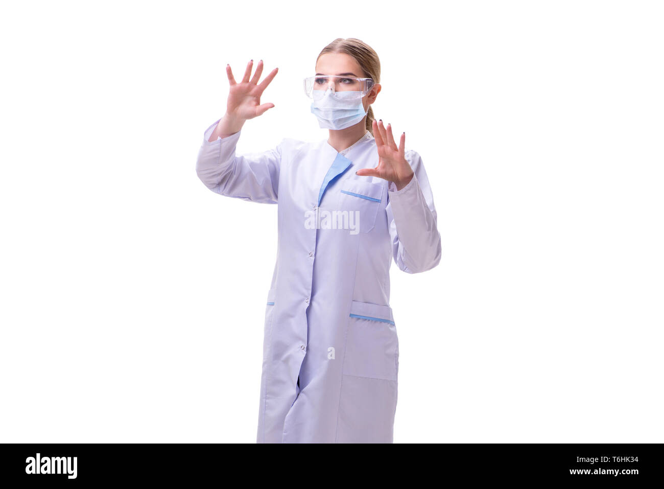 Young woman doctor isolated on white background Stock Photo - Alamy