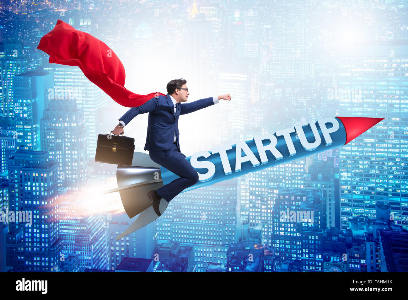 Superhero businessman in start-up concept flying rocket Stock Photo - Alamy