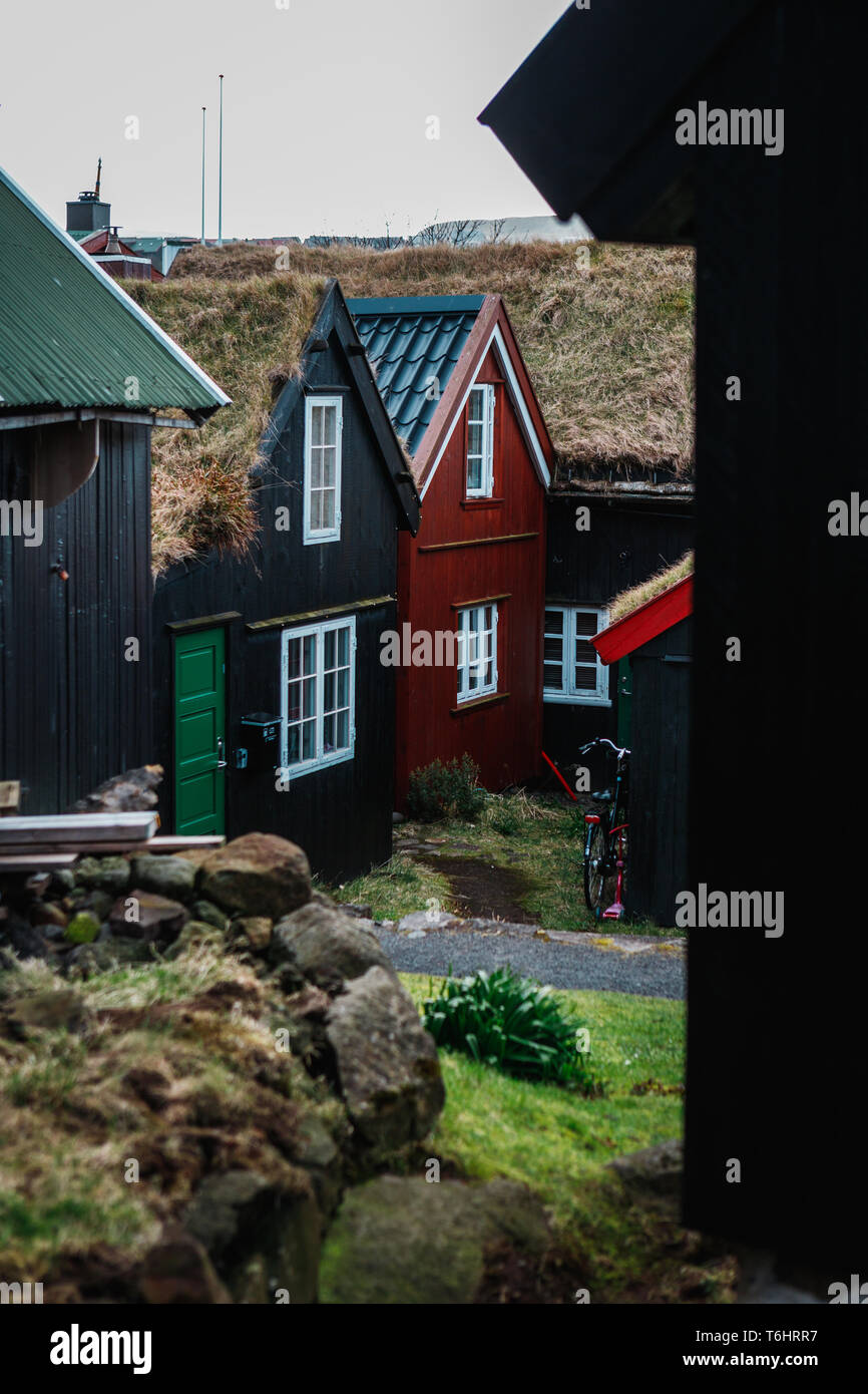 Typical colourful wooden houses with moss-covered roofs in the centre of Tórshavn (Faroe Islands, Denmark, Europe) Stock Photo