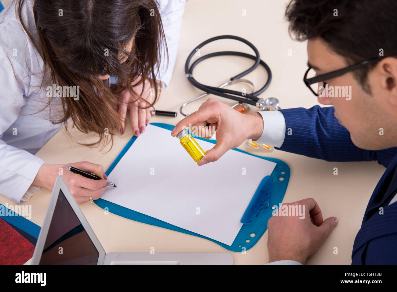 Man visiting doctor for routine check-up Stock Photo - Alamy