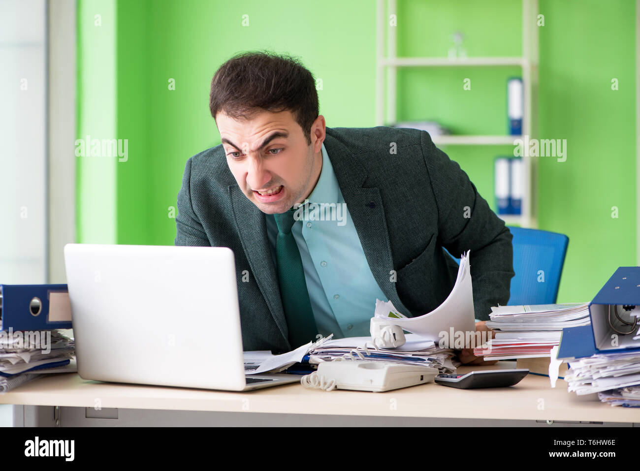 Businessman angry excessive work hi-res stock photography and images ...