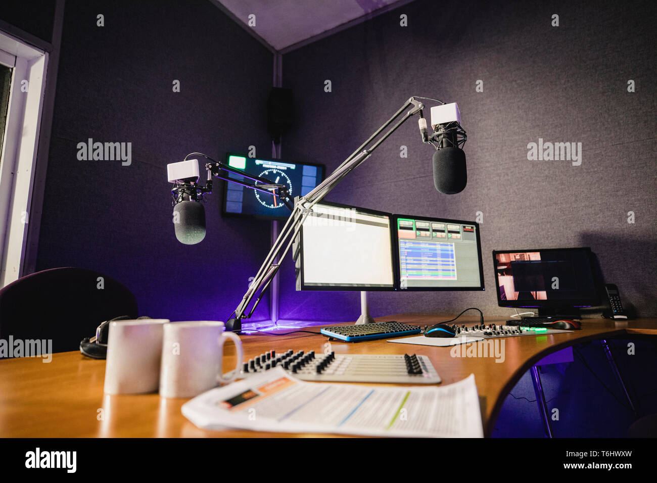 A Front View Shot Of A Radio Station Studio Interior A Large Desk