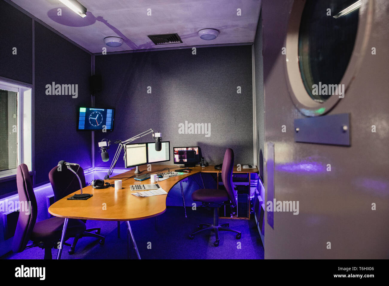 A Front View Shot Of A Radio Station Studio Interior A Large Desk