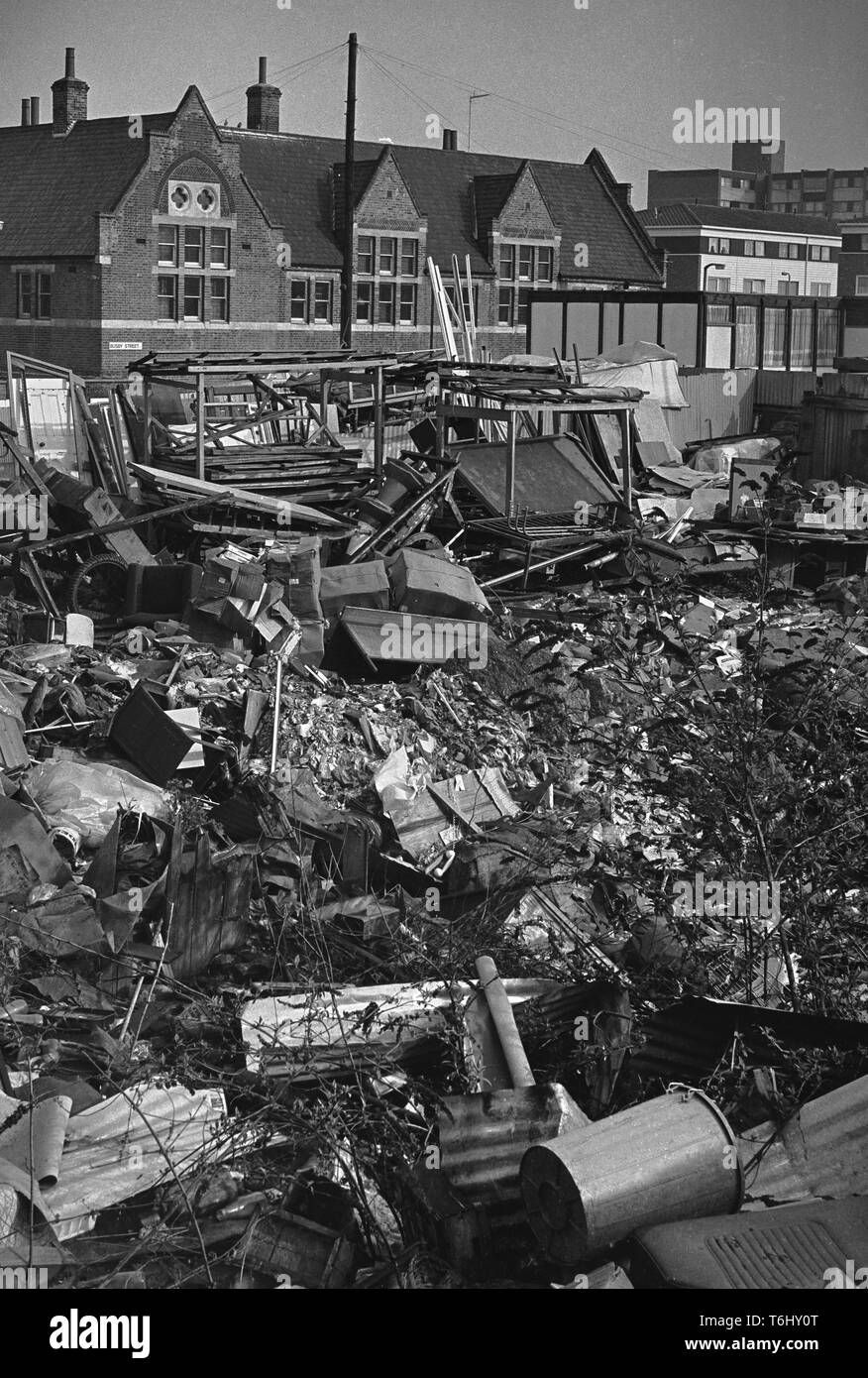 8/31 Tower Hamlets St Matthias Primary School , rubbish on empty site nearby 1979 Stock Photo