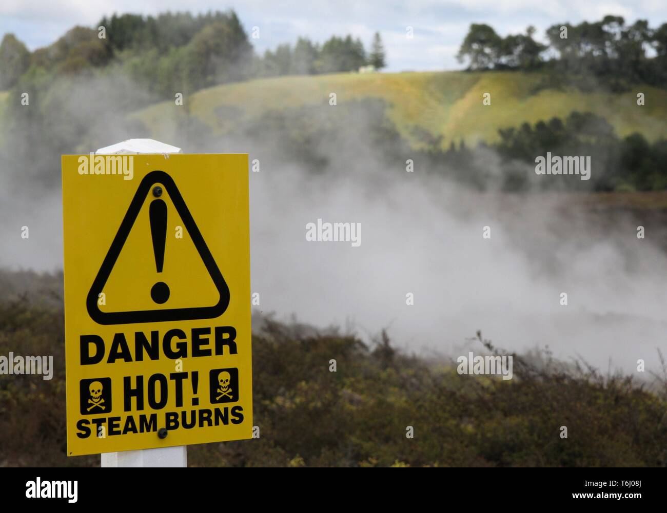 Yellow warning sign for hot steam burns at Orakei Korako Thermal Area