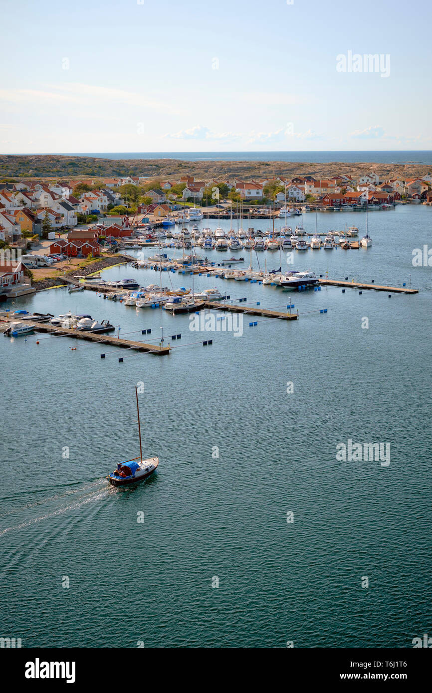 Looking down to the marina and coastline of Smogen on the Bohuslan coast in Vastra Gotaland Sweden. Stock Photo