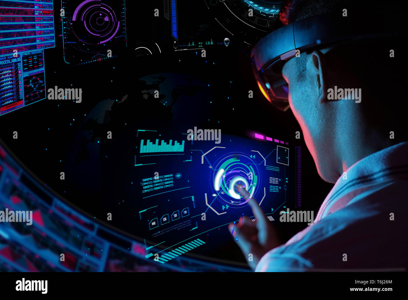 Business man try vr glasses hololens in the dark room | Young asian boy experience ar with glow earth globe on hand | Future technology concept | Faci Stock Photo