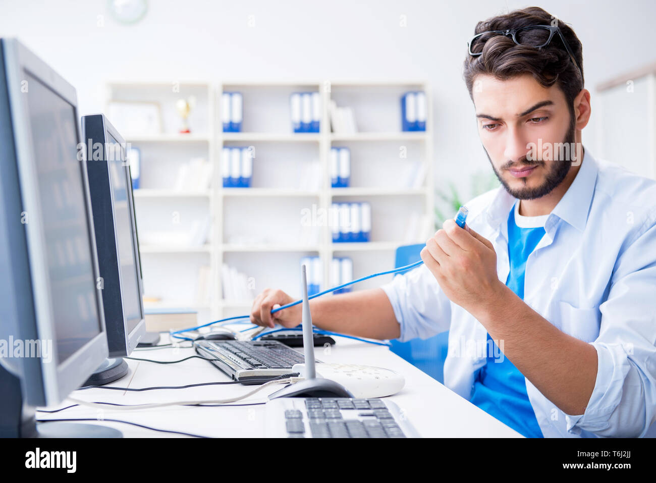 Frustrated young man due to weak internet reception Stock Photo - Alamy