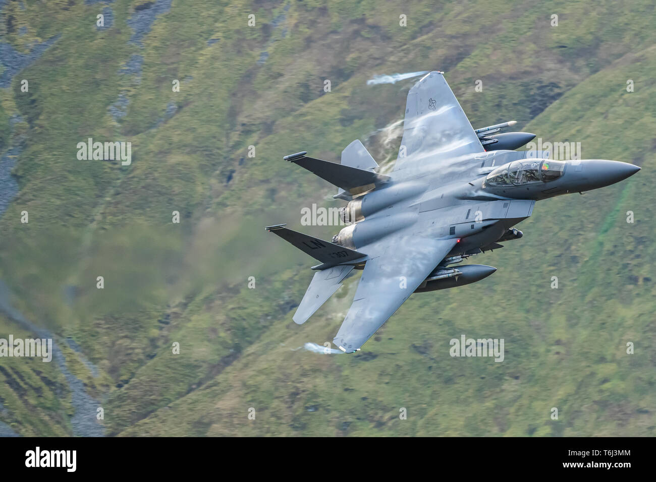 USAF F-15s doing Low Level training through North Wales Stock Photo