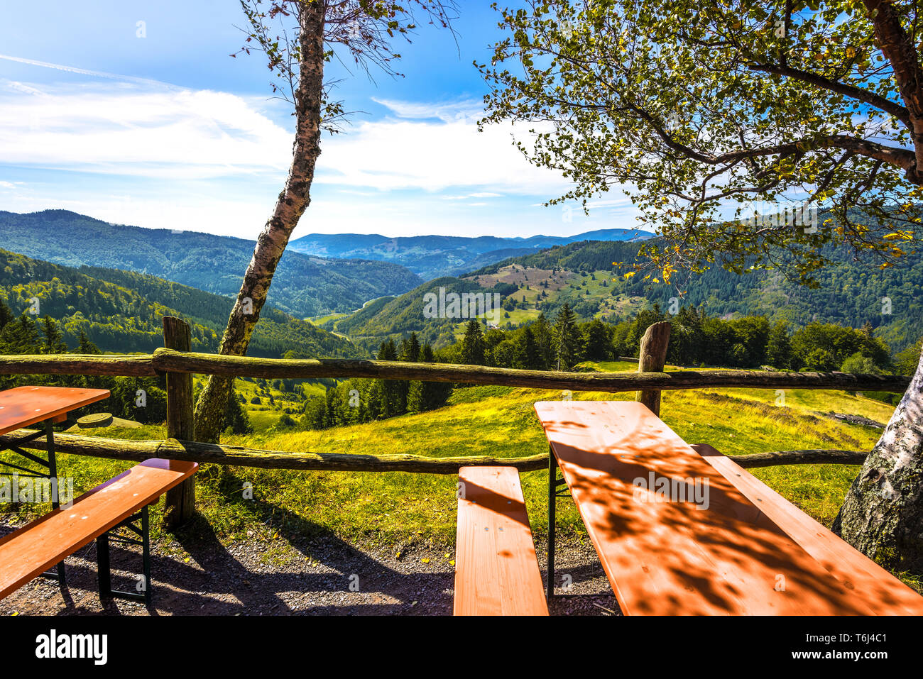 panorama view at mountain guesthouse Hasenhorn, viewpoint of Todtnau, Germany, valley Wiesental in the southern Black Forest, beer garden Stock Photo