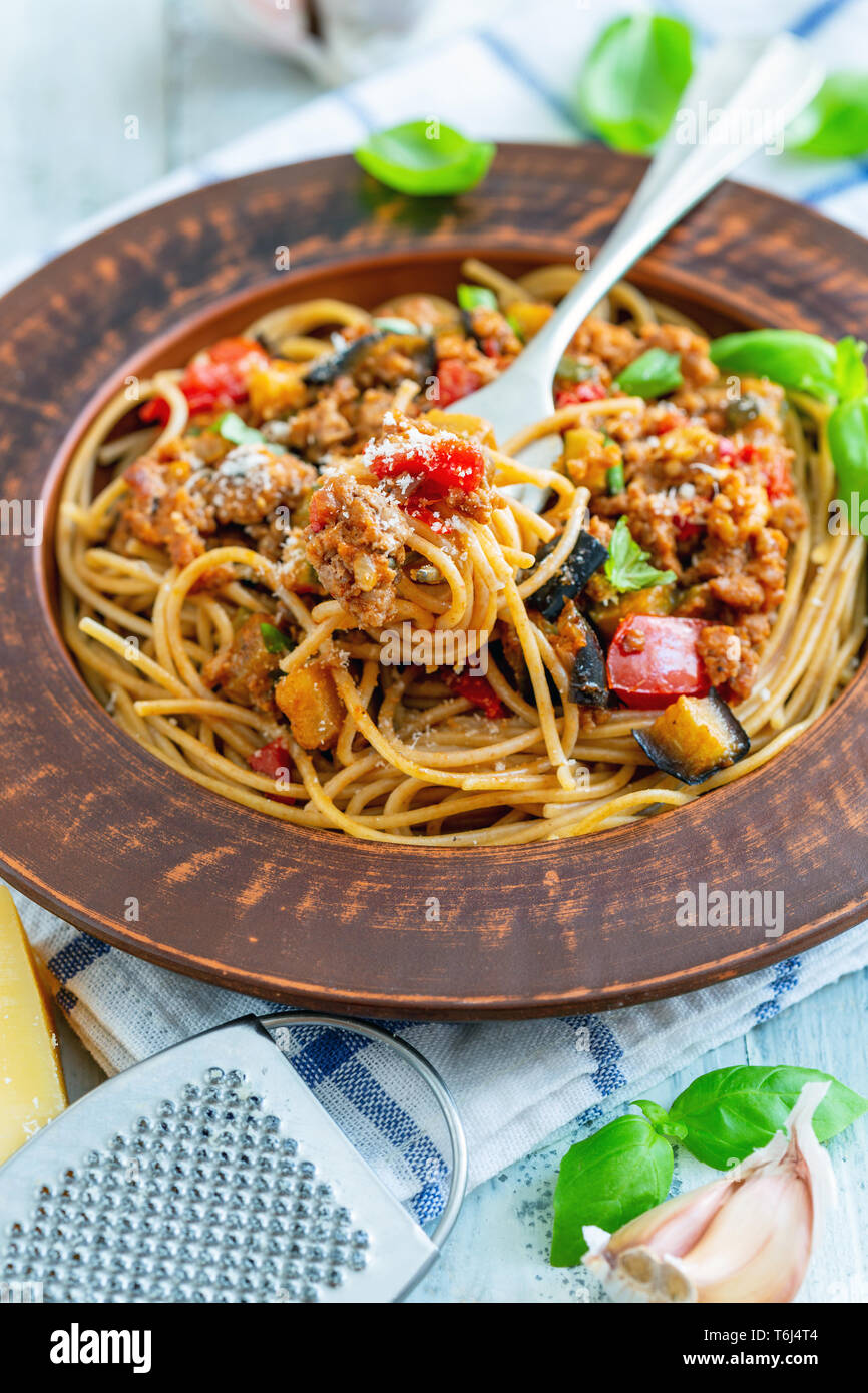 Spaghetti with bolognese sauce, vegetables and basil Stock Photo Alamy